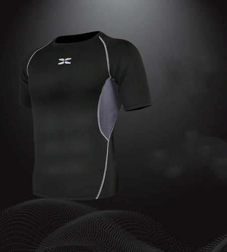 Black athletic shirt with a logo on a dark background