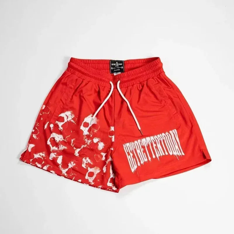 Red shorts with white graphics and text on a light gray background