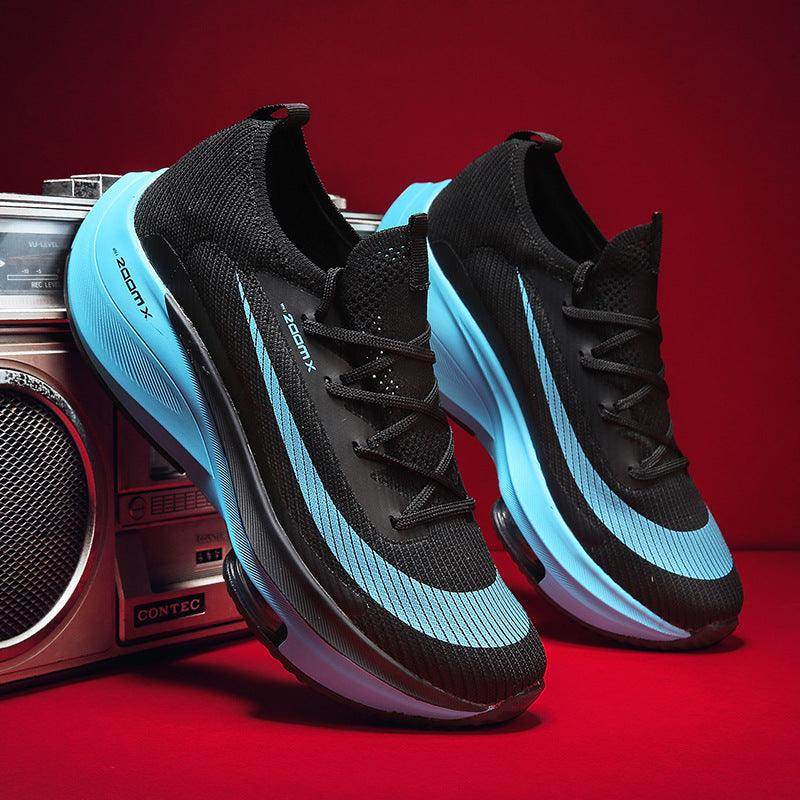 Black and blue athletic shoes on a red background with a boombox.