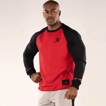 Man wearing a red and black long-sleeve shirt with a logo on a white background