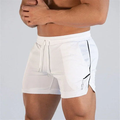 White athletic shorts with a black stripe on a gray background