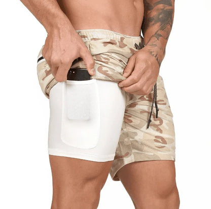 Person wearing camouflage and white shorts on a white background