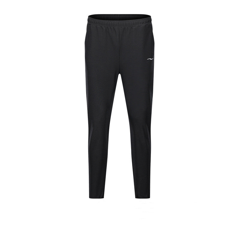 Black pants with a brand logo on a white background