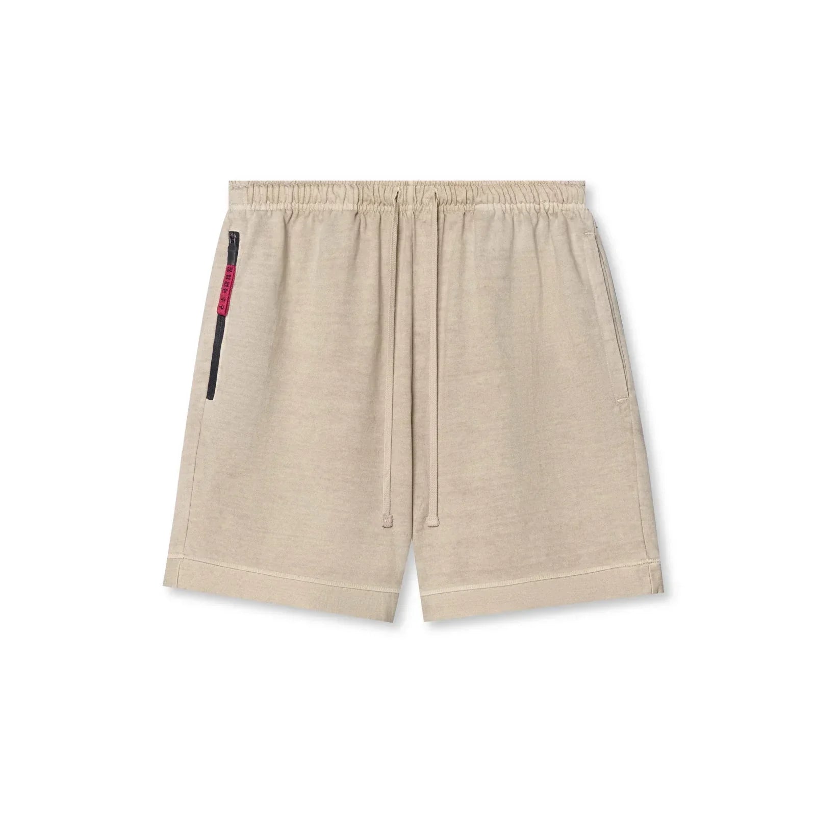 Beige shorts with a small black and red detail on a white background