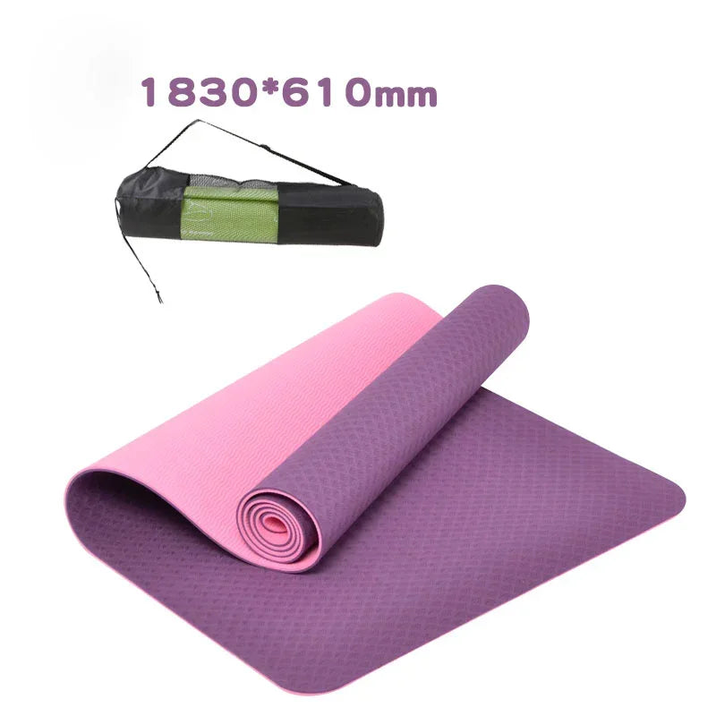 Purple and pink yoga mat with carrying strap on a white background