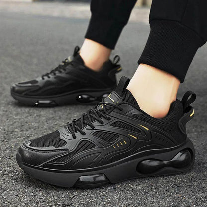 Black sneakers being worn on a dark surface