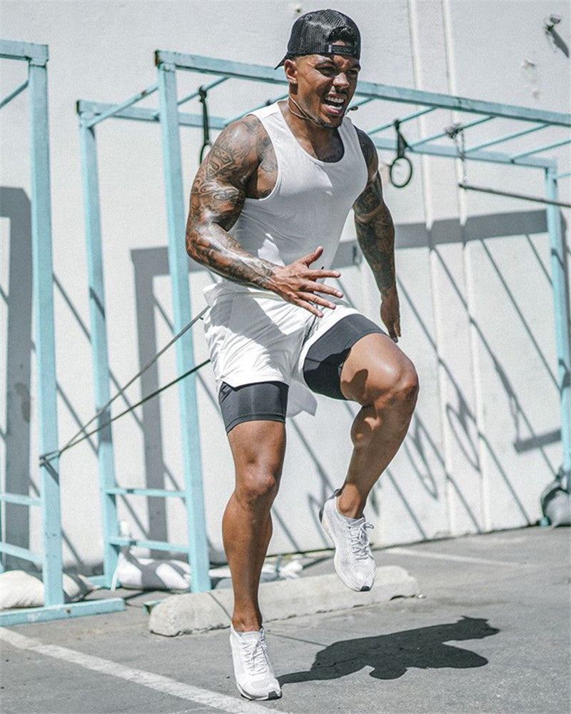 Man in athletic wear running outdoors on a sunny day