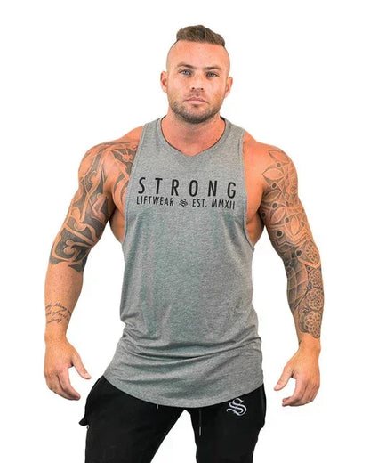 Man wearing a gray tank top with 'STRONG LIFTWEAR' logo on a white background