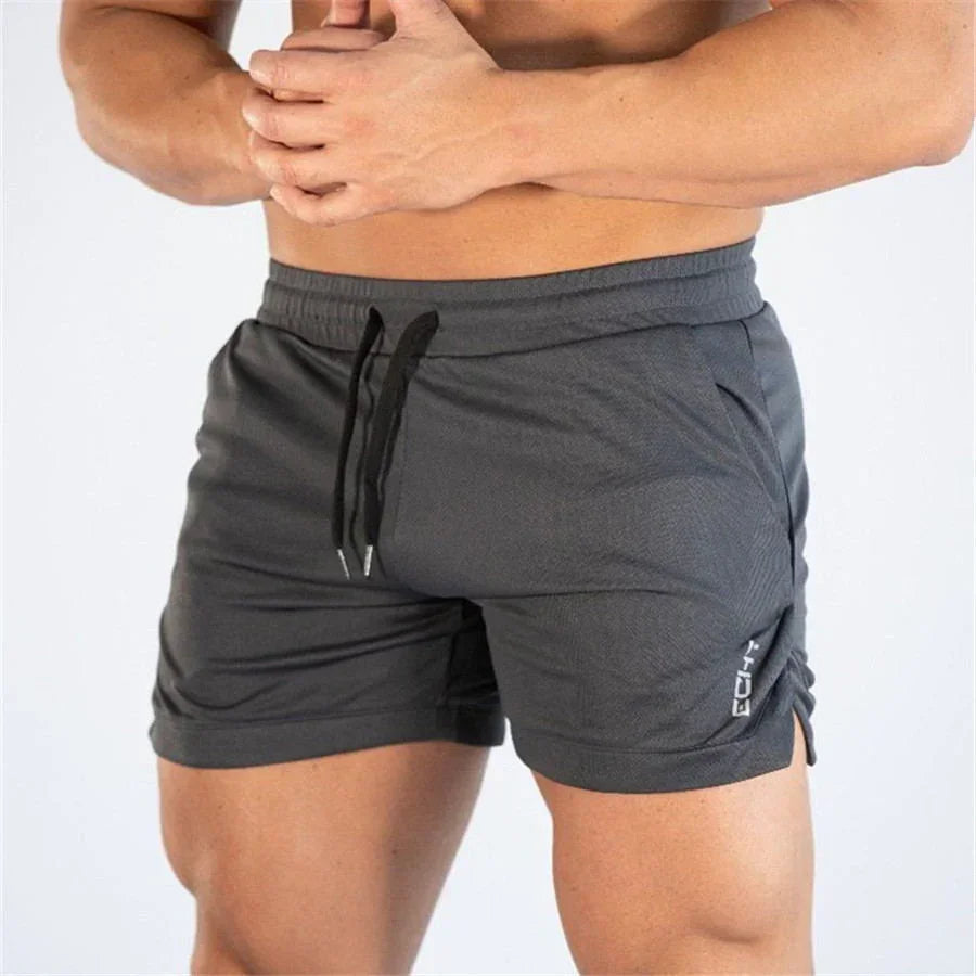 Gray shorts with a drawstring on a white background