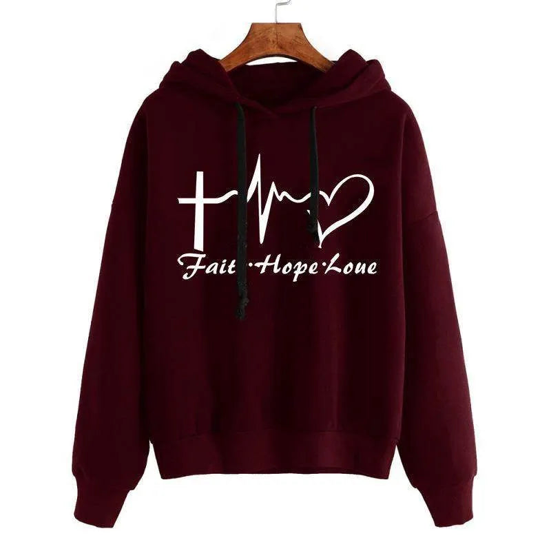 Maroon hoodie with 'Faith Hope Love' text and symbols on a white background