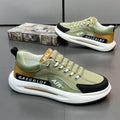Green and brown sneakers with 'GAECRLOF' branding on a gray surface.