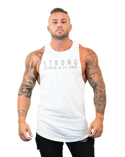 Man wearing a white tank top with 'STRONG' branding on a white background