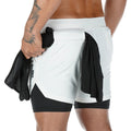 White athletic shorts with black accents worn by a person on a white background
