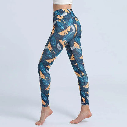 Leggings with a blue and orange leaf pattern on a white background
