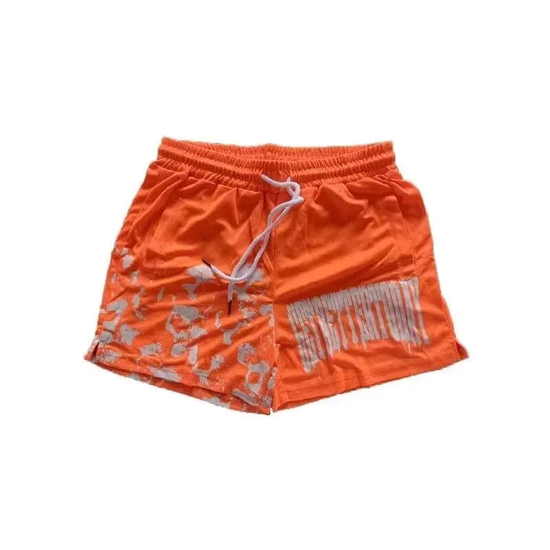 Orange shorts with a logo on a white background