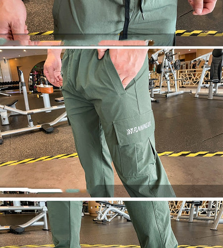 Green athletic pants being modeled in a gym setting