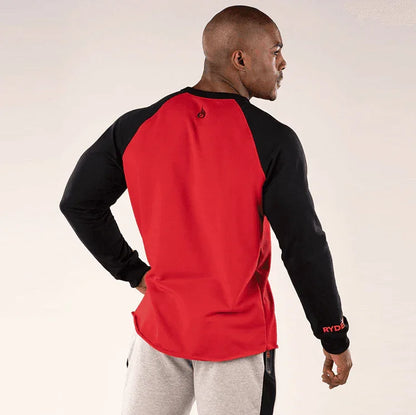 Person wearing a red and black long-sleeve shirt with 'Ryde' branding on a white background