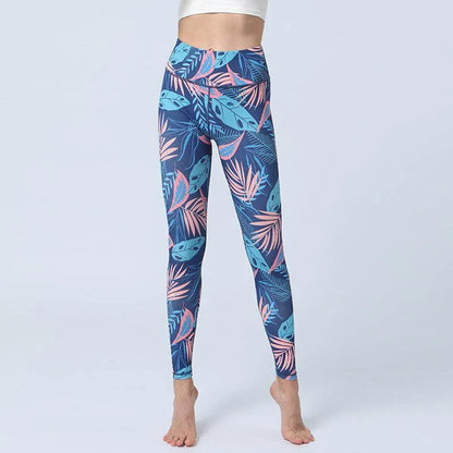 Blue leggings with pink and green leaf pattern on a white background