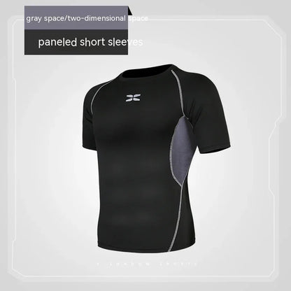 Black athletic shirt with gray panels on a light gray background