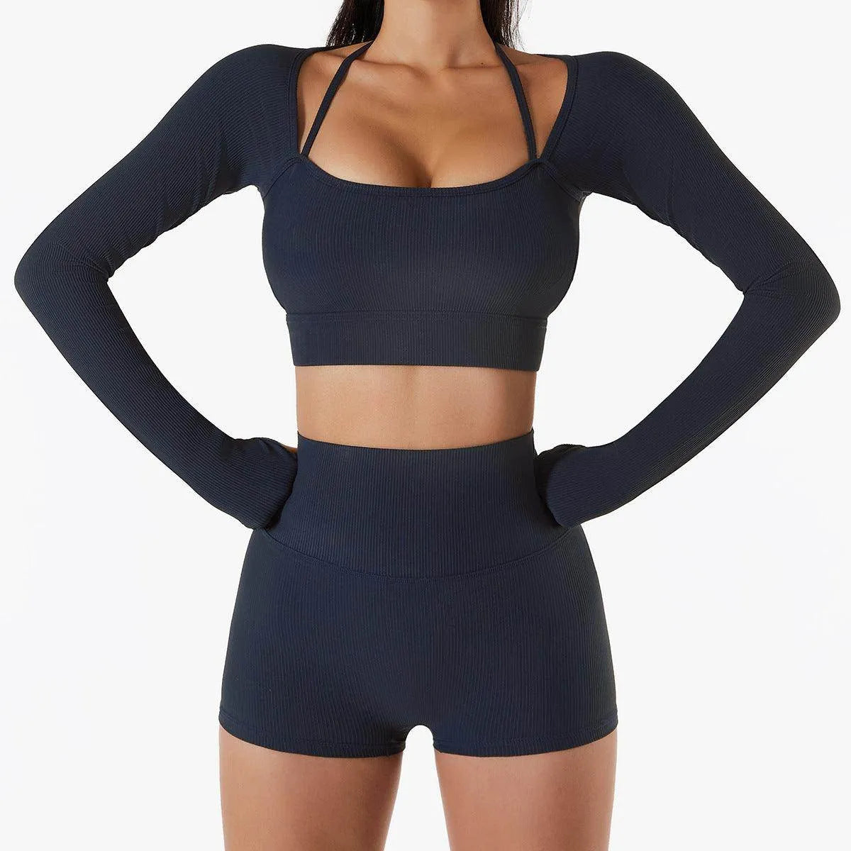 Person wearing a navy blue athletic outfit on a white background