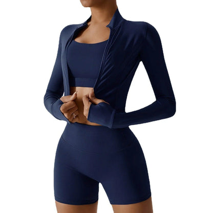 Navy blue athletic outfit with long-sleeve top and shorts on a white background