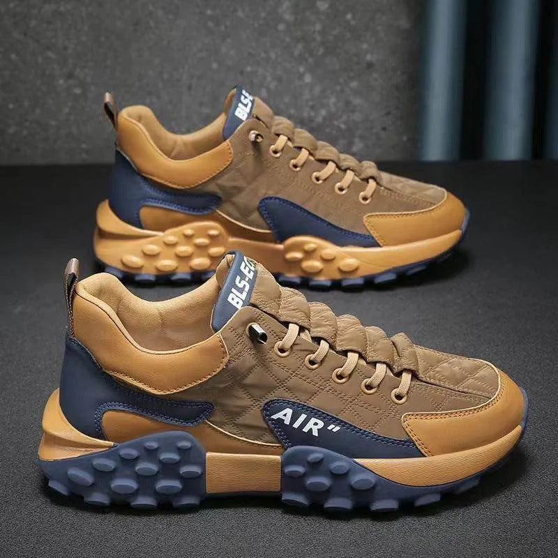 Brown and blue sneakers on a dark background