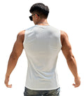 Man wearing a white tank top on a white background