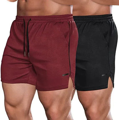 Two pairs of men's shorts, one maroon and one black, on a plain background.