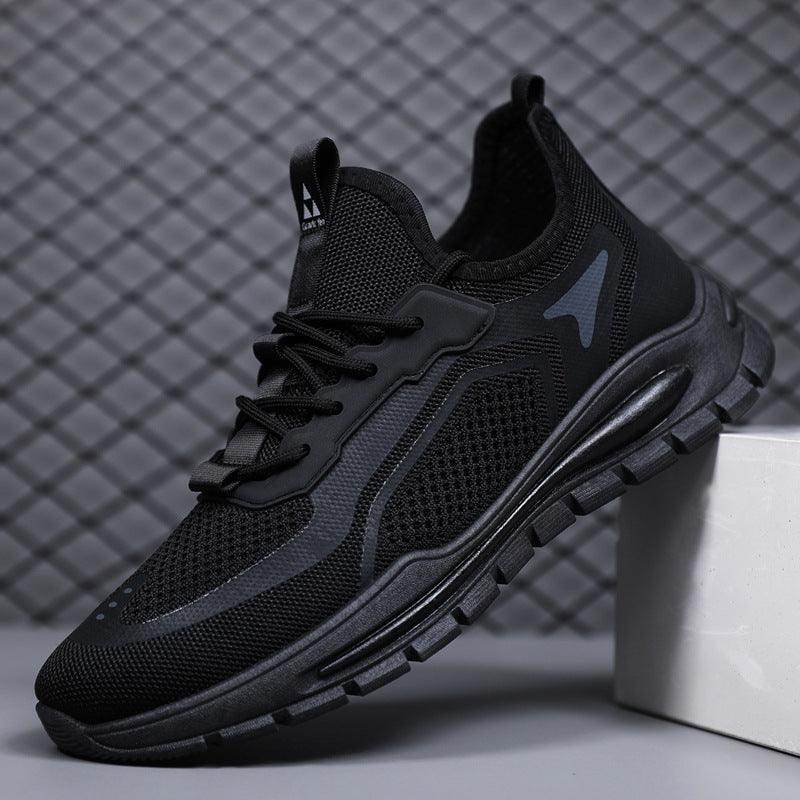Black athletic shoe on a gray background
