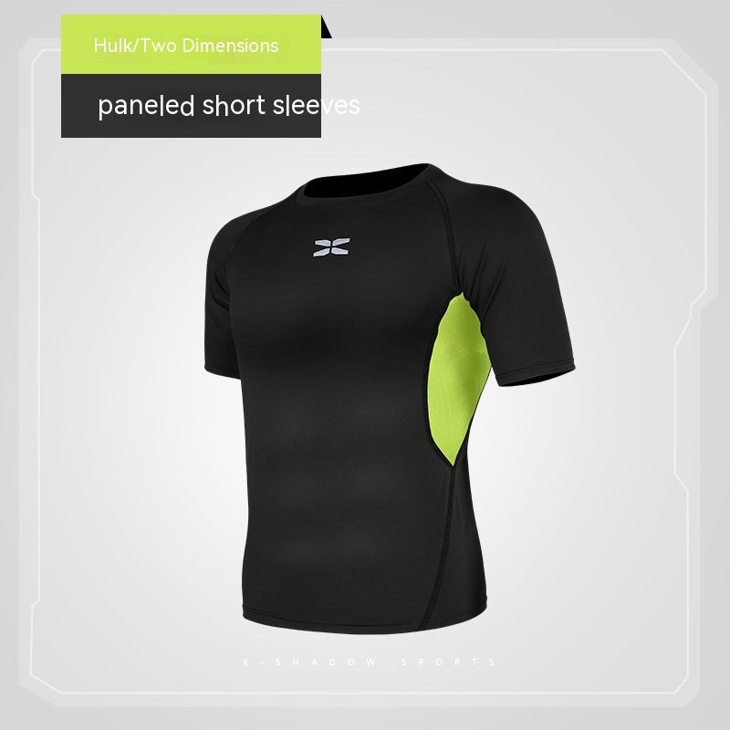 Black athletic shirt with green panels on a gray background